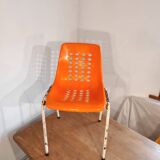 Chair with openwork plastic shell 1970