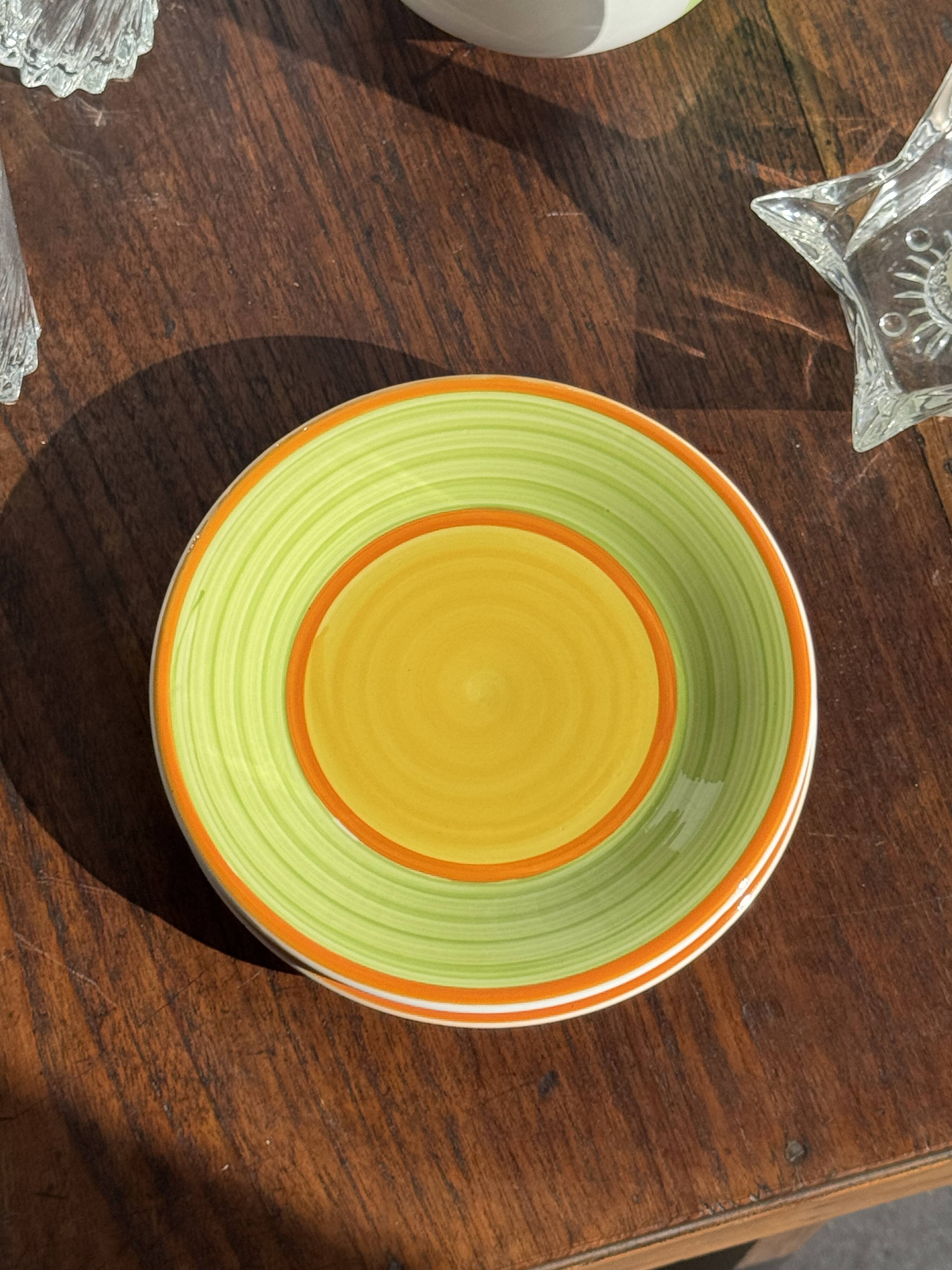 Set of 4 Italian ceramic plates in green, orange, and yellow splashes D20.