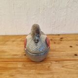 Antique earthenware terrine in the shape of a duck.