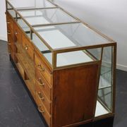 Counter or shop window in oak glass and brass France around 1920