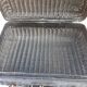 Old black wicker suitcase