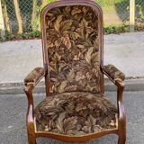 Louis XV Voltaire armchair in solid wood and floral velvet fabric from the years.