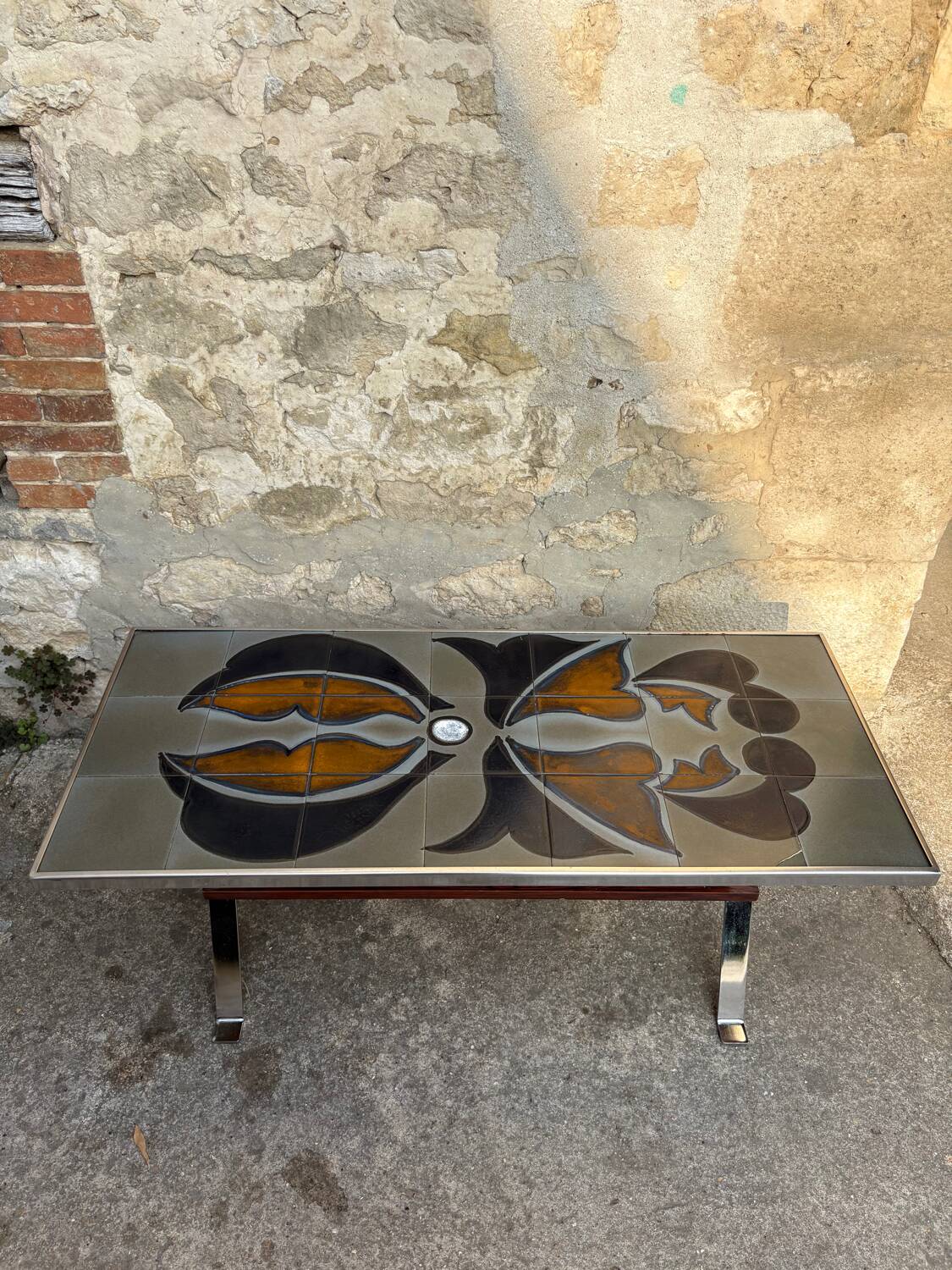 Vintage 1970s ceramic tile coffee table with chrome legs.