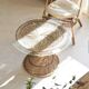 Table basse diabolo en rotin et plateau en verre