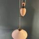 Suspension rises and falls with counterweight in porcelain and opaline