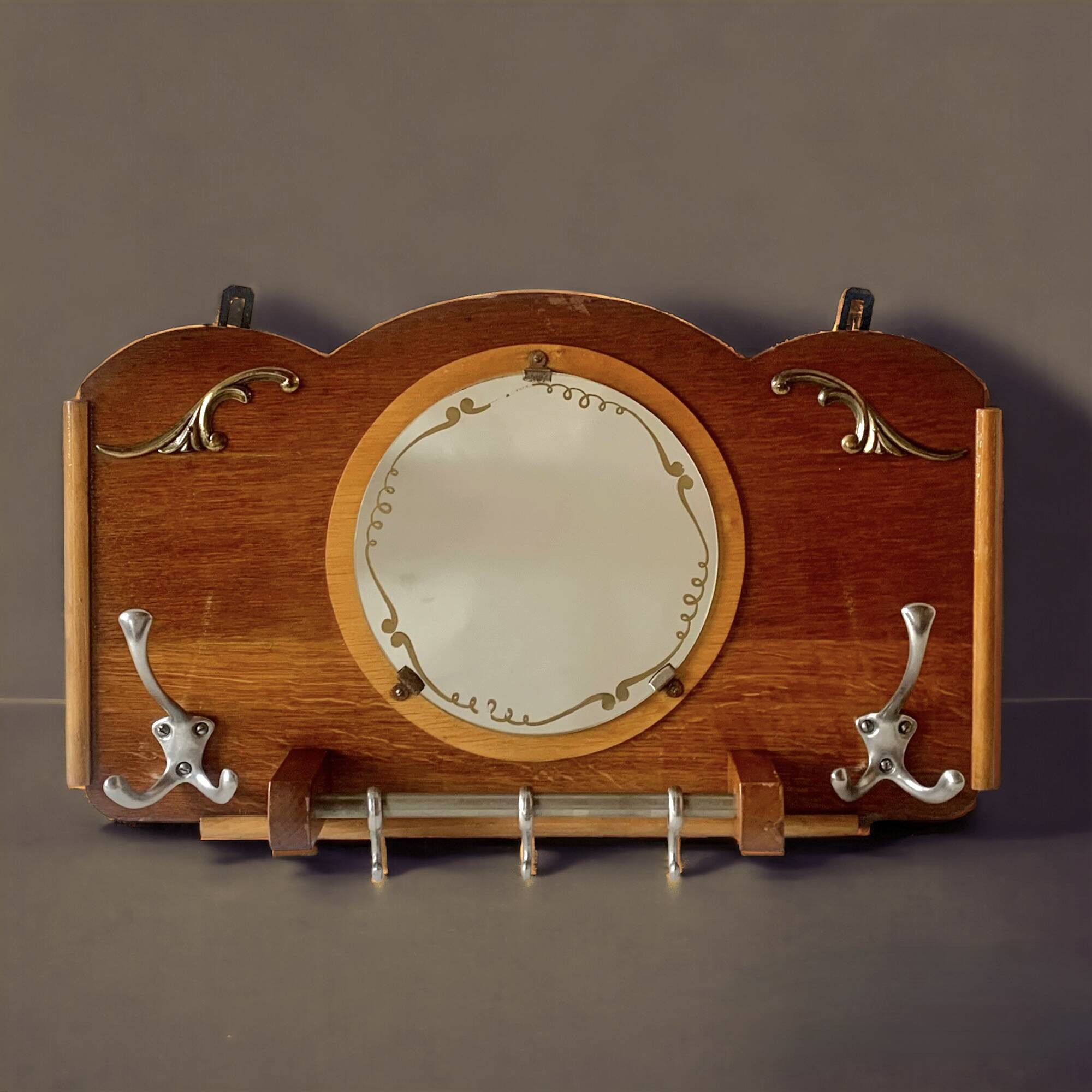 Art Deco wooden wall coat rack with round central mirror
