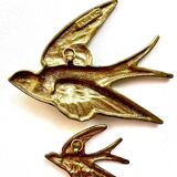 Pair of copper swallows