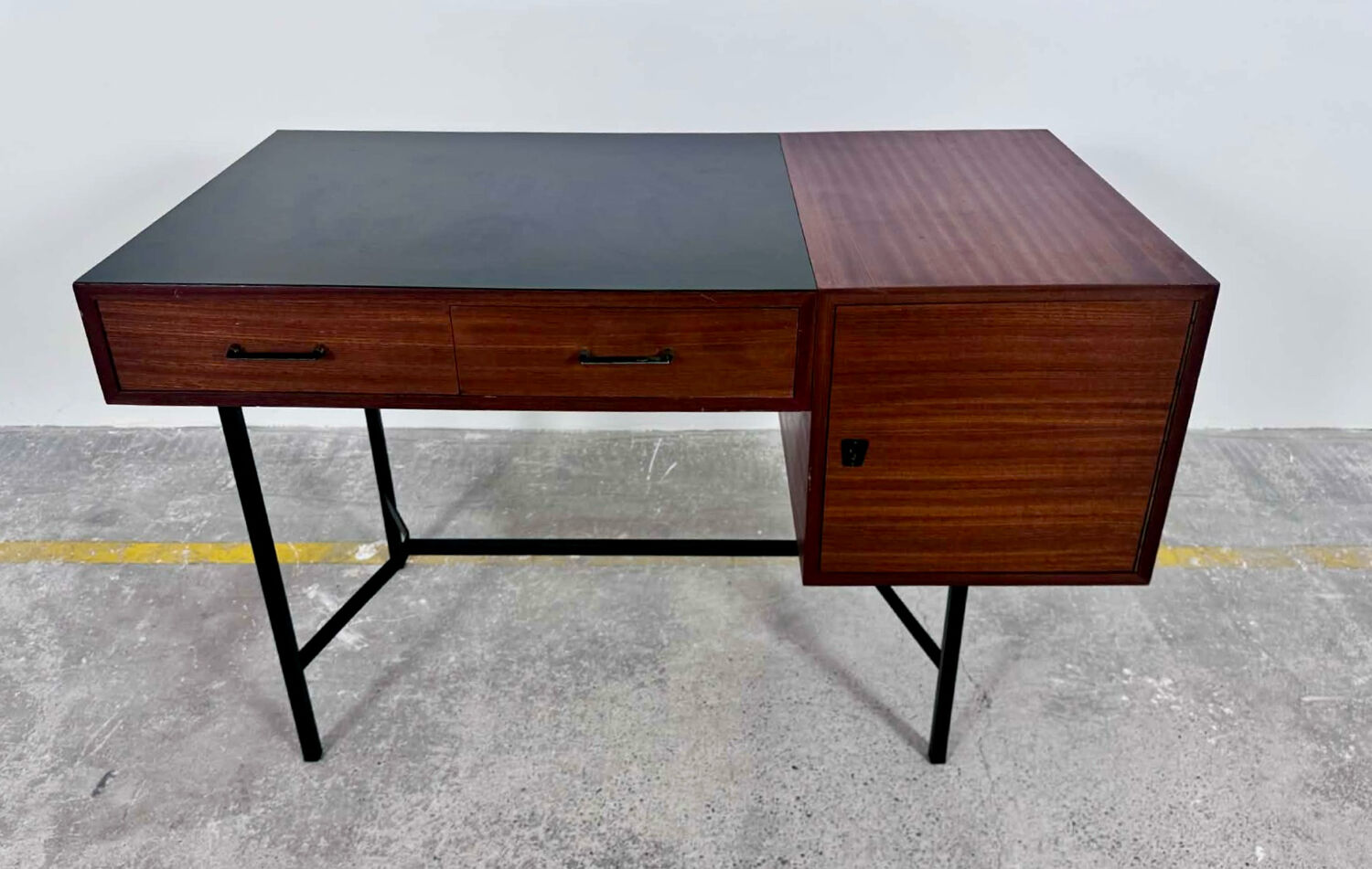 French modernist desk from the 1950s with 2 drawers, 1 cabinet, and 1 container.