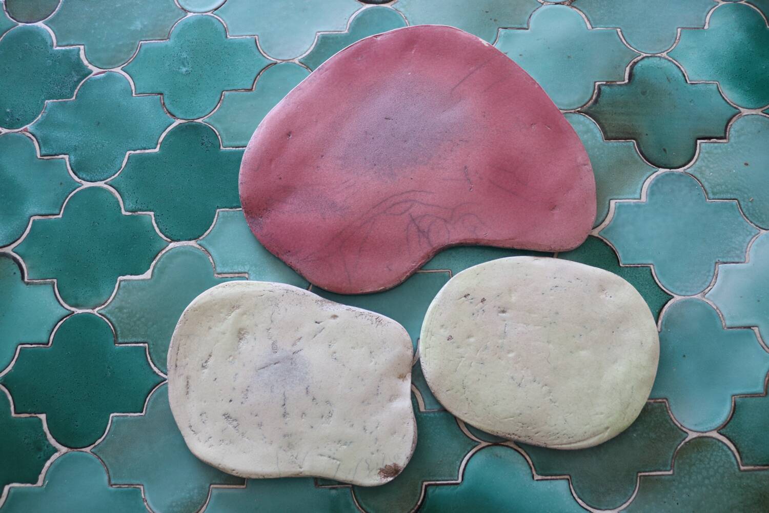 Set of 3 handmade raku ceramic trivets.