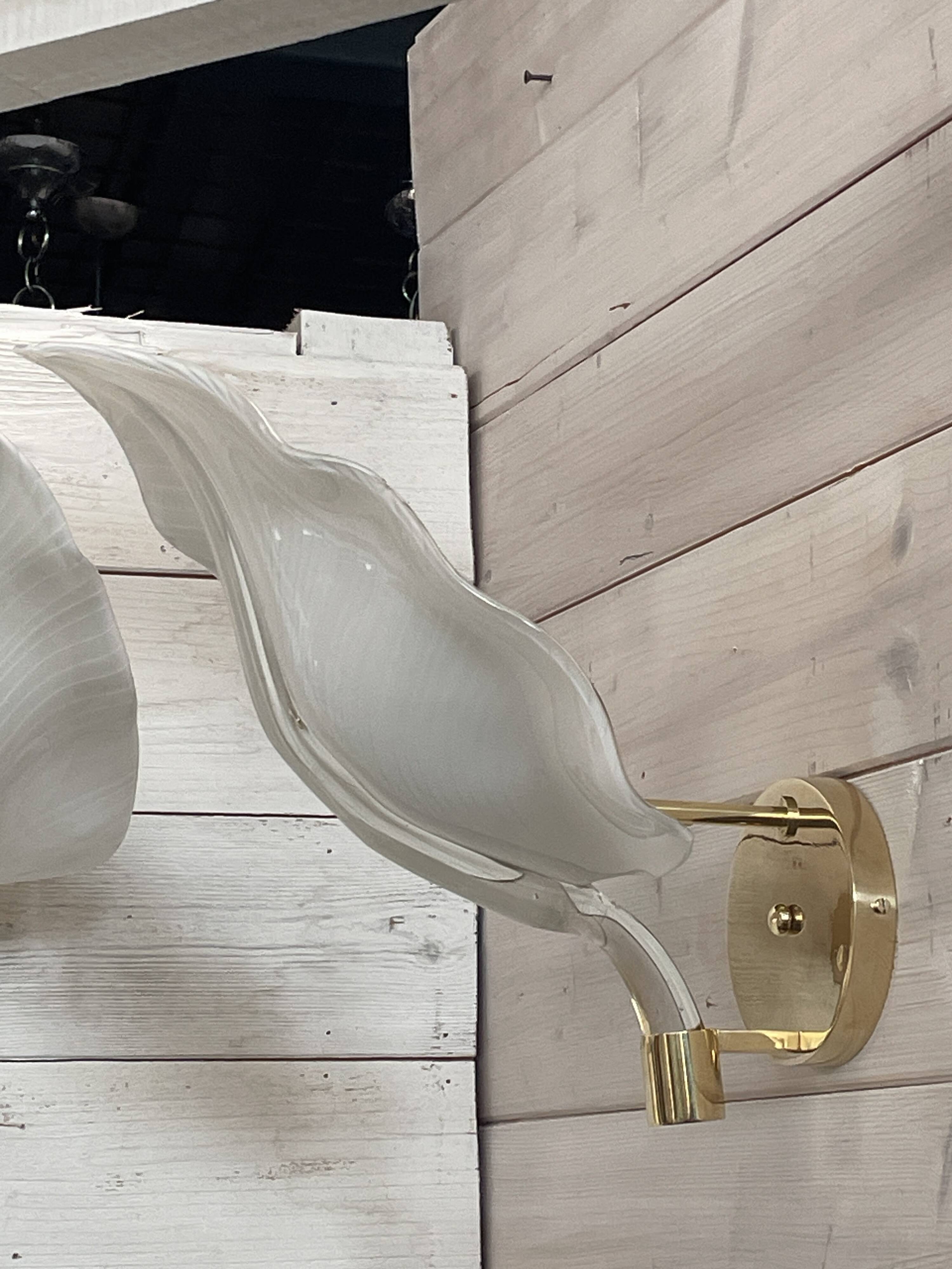 Set of 3 Murano glass wall lamps in white and brass, 1970s.