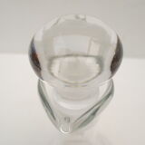 small glass decanter with its handle and spout