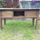 Farm table with panels with oak spindle feet. (said dairy table)
