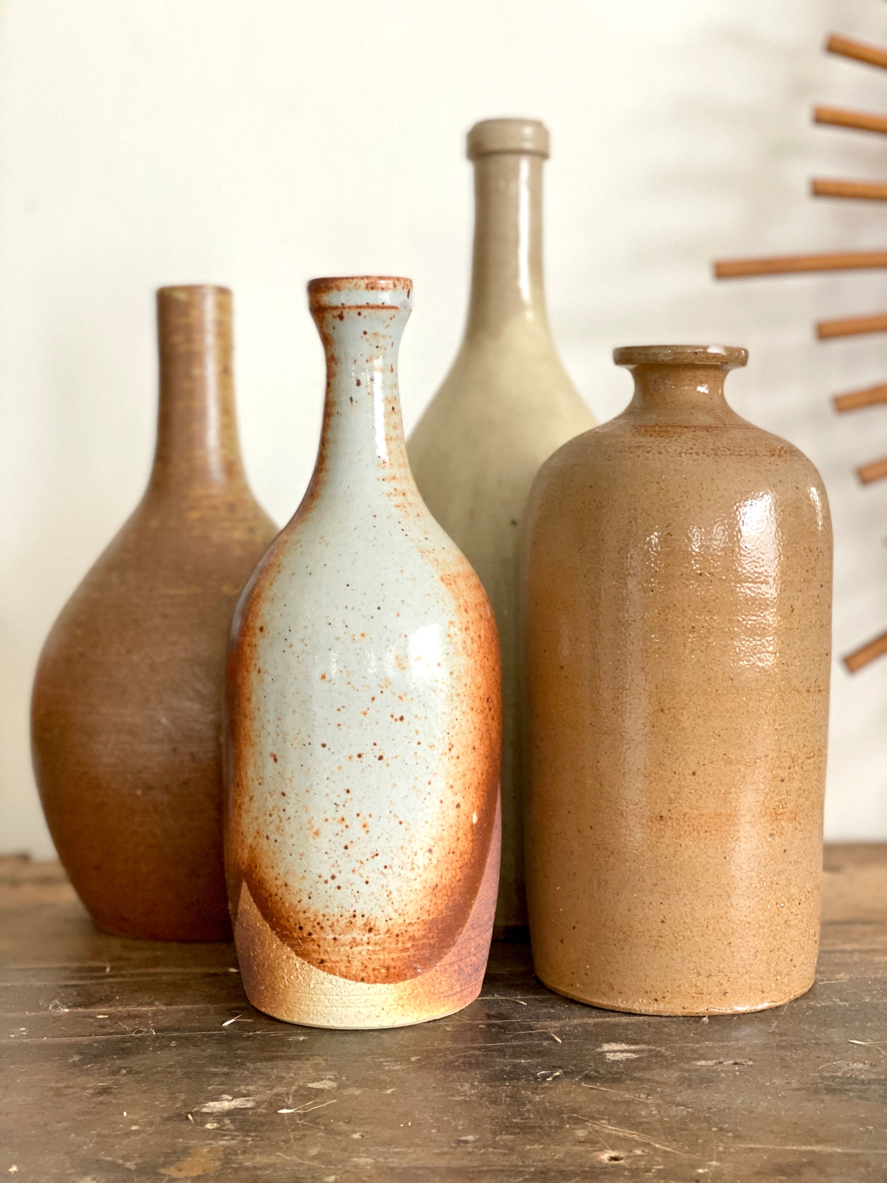 Lot de 4 bouteilles en grès vintage