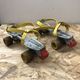 Old pair of speedy metal roller skates grey + straps & vintage brake