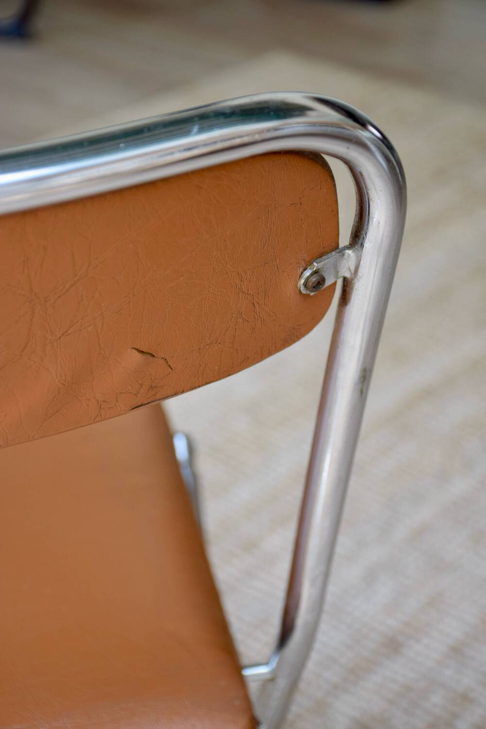Pair of “Soudexvinyl” folding chairs in skai and chrome tube