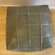 Grey leather pouf