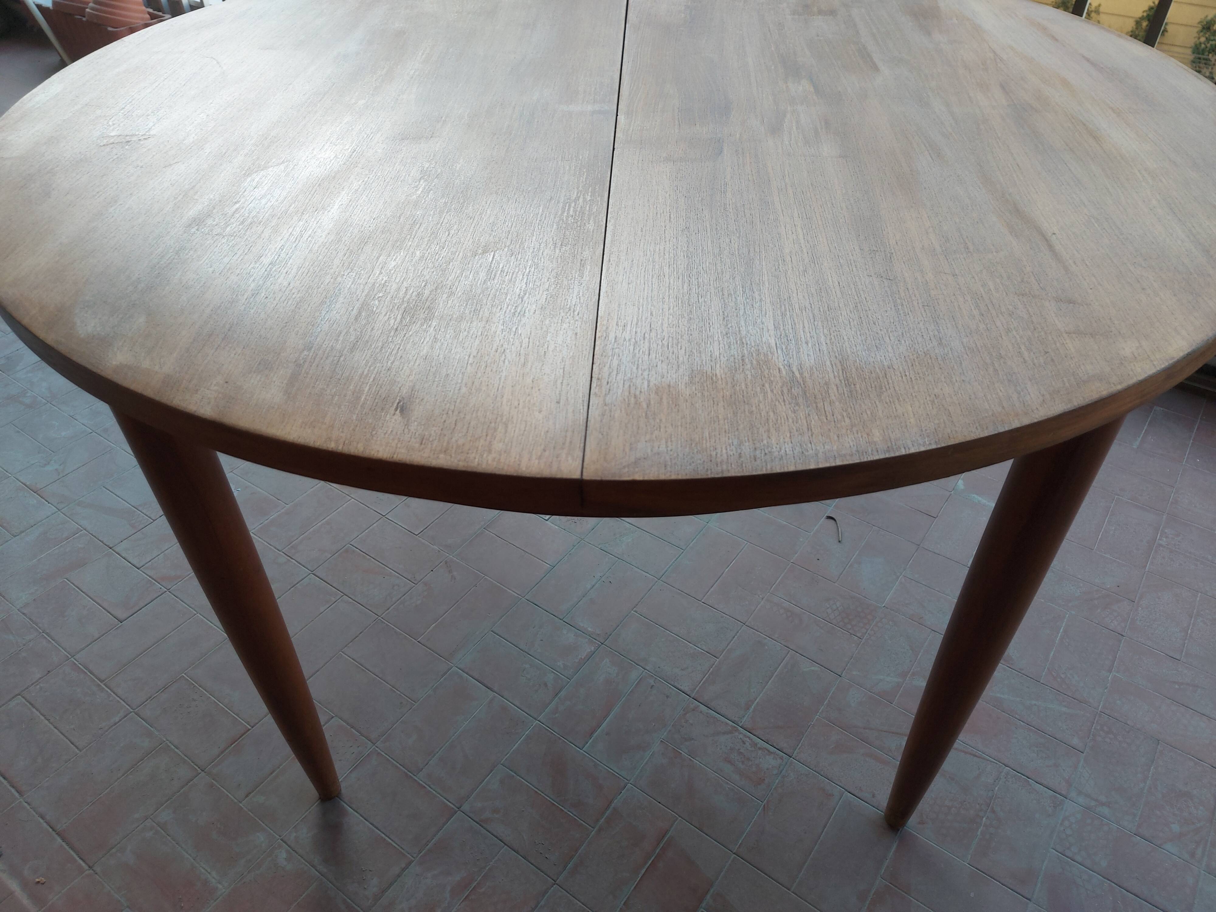 Scandinavian design teak table with extension cord