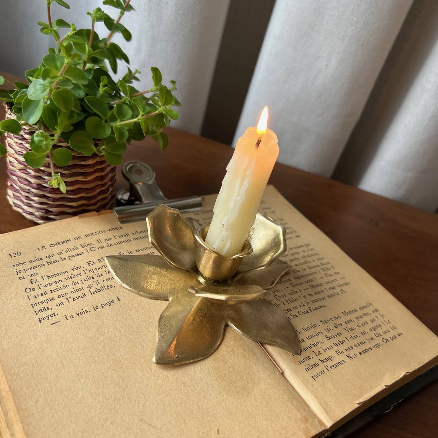 Small brass “flower” candle holder