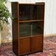 Small English oak library from the 1960s with sliding doors.