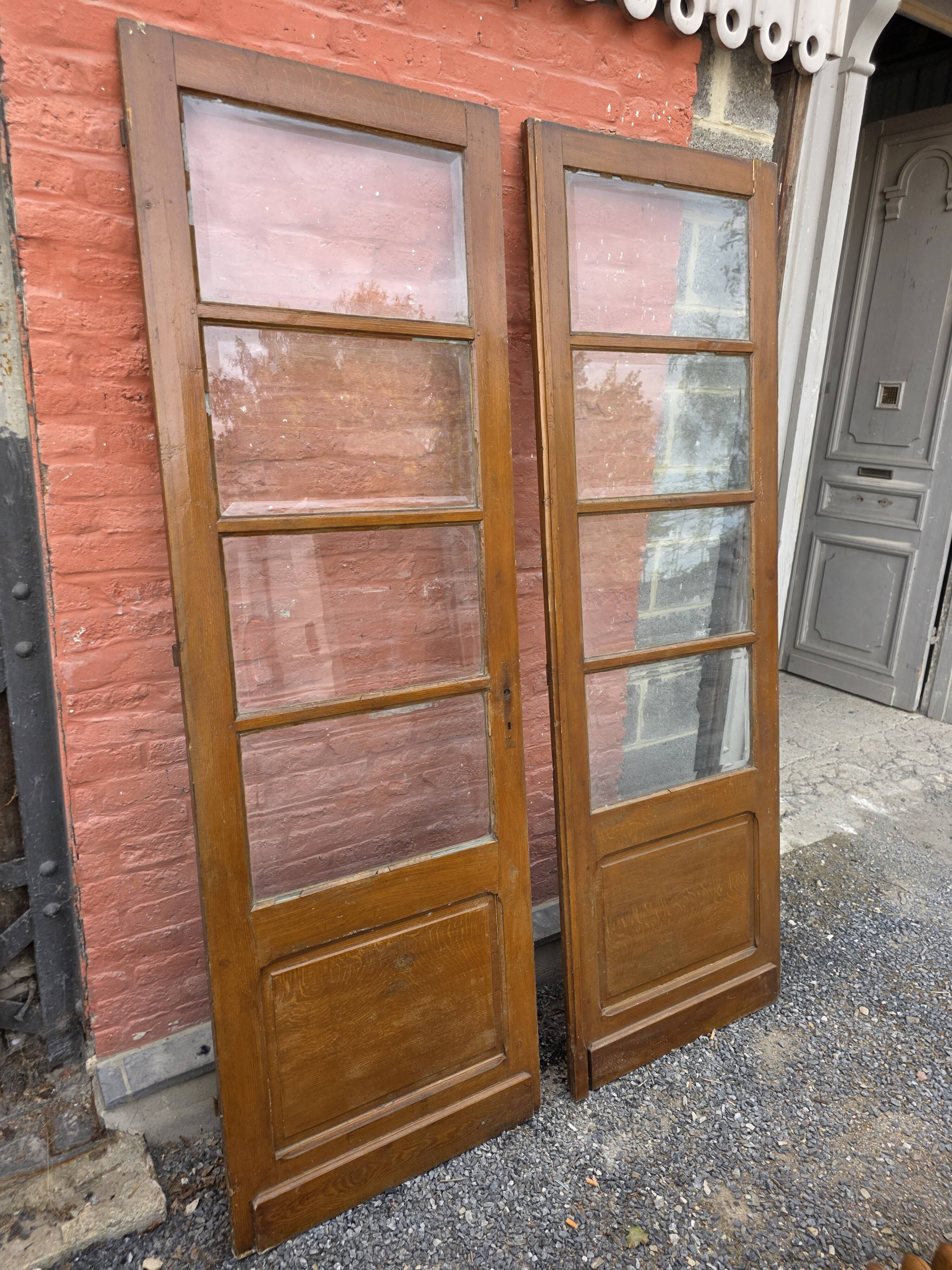 Paire de portes de séparation anciennes, verres biseautés