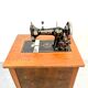 Mechanical Kohler sewing machine and its furniture with manual and replacement needle