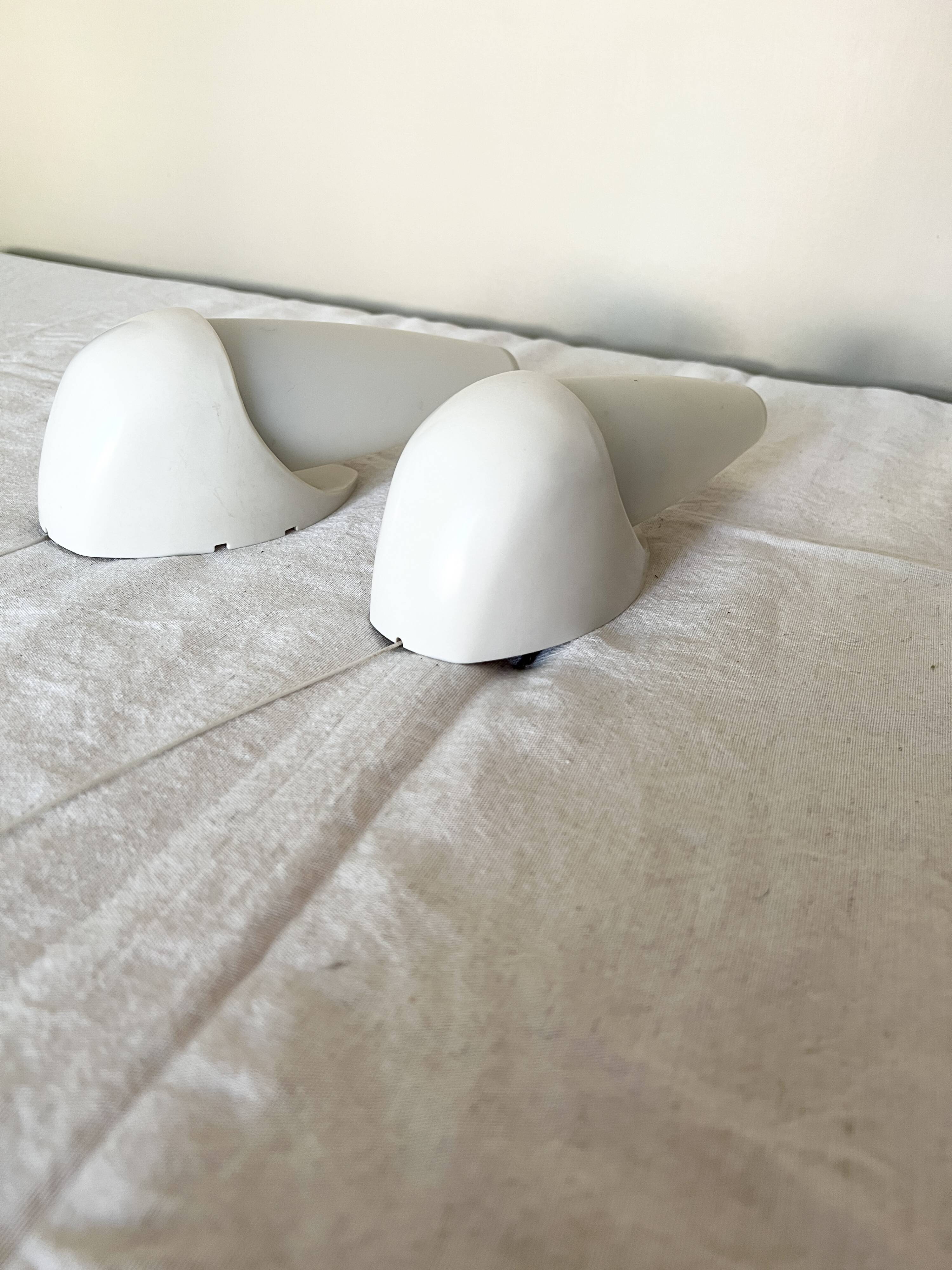 Set of two Small mid-century bakelite & glass wall lamps by Bo Niko Belgium, 1960s