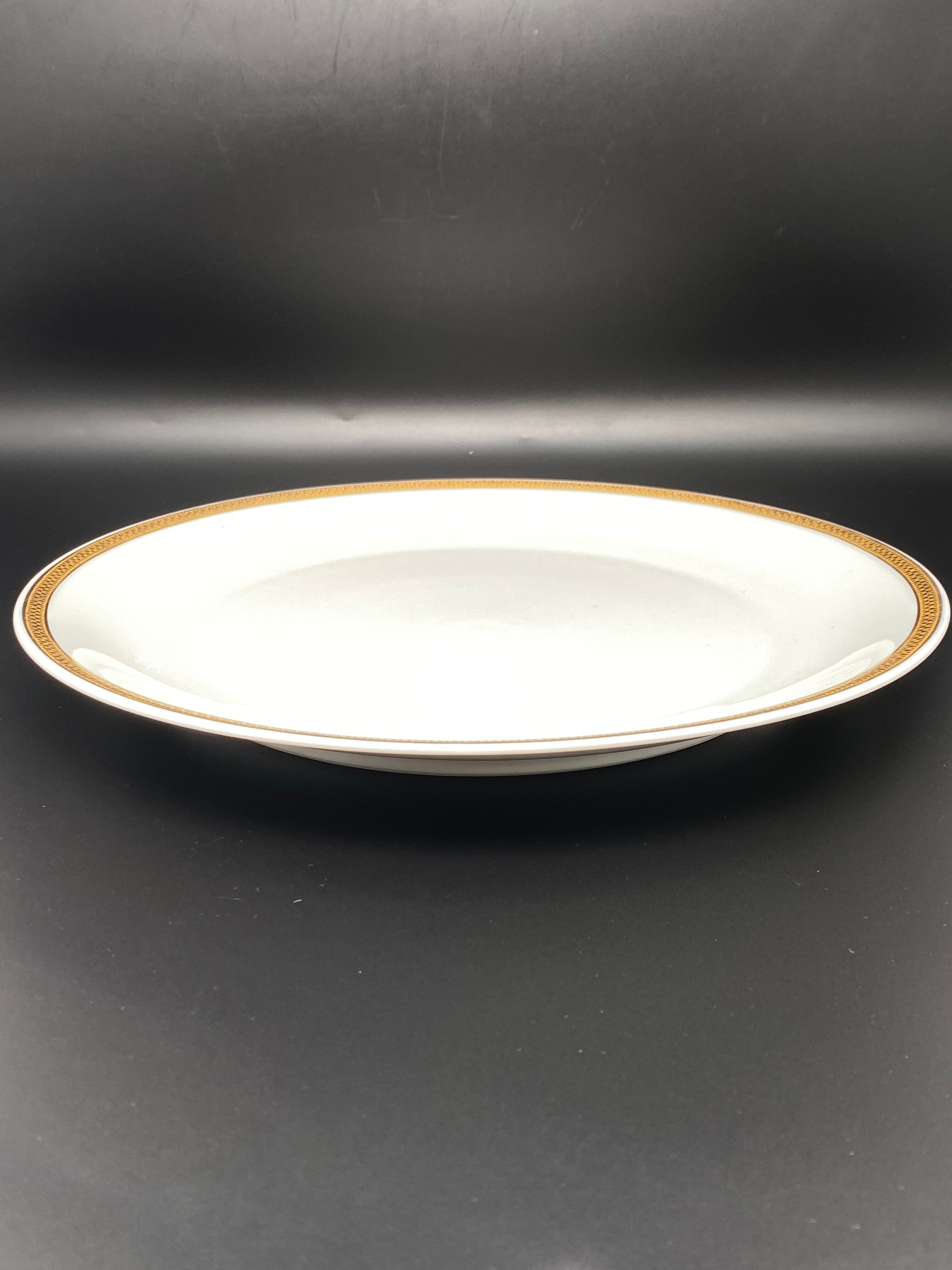 Flat round serving dish Limoges gold edging