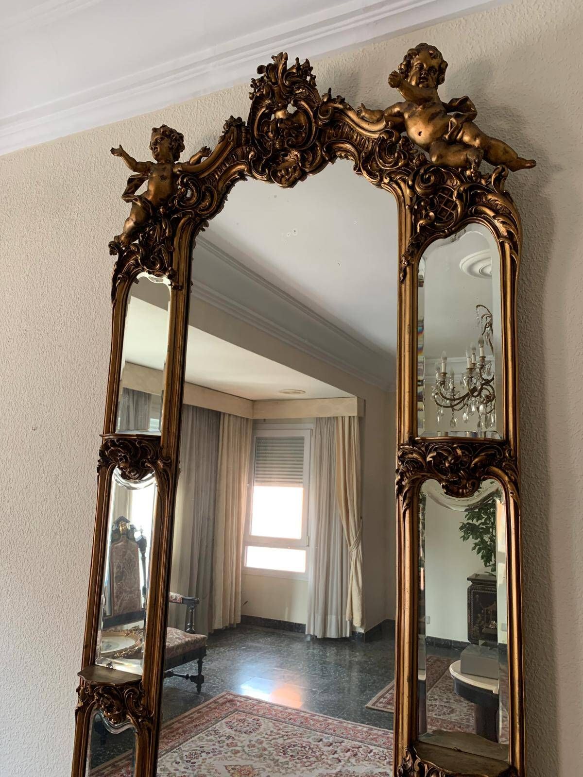 Golden Rococo-style mirror with chest