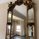 Golden Rococo-style mirror with chest