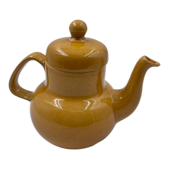 Yellow ceramic teapot