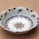 Shallow flat dish in Nevers faience from the 18th century.