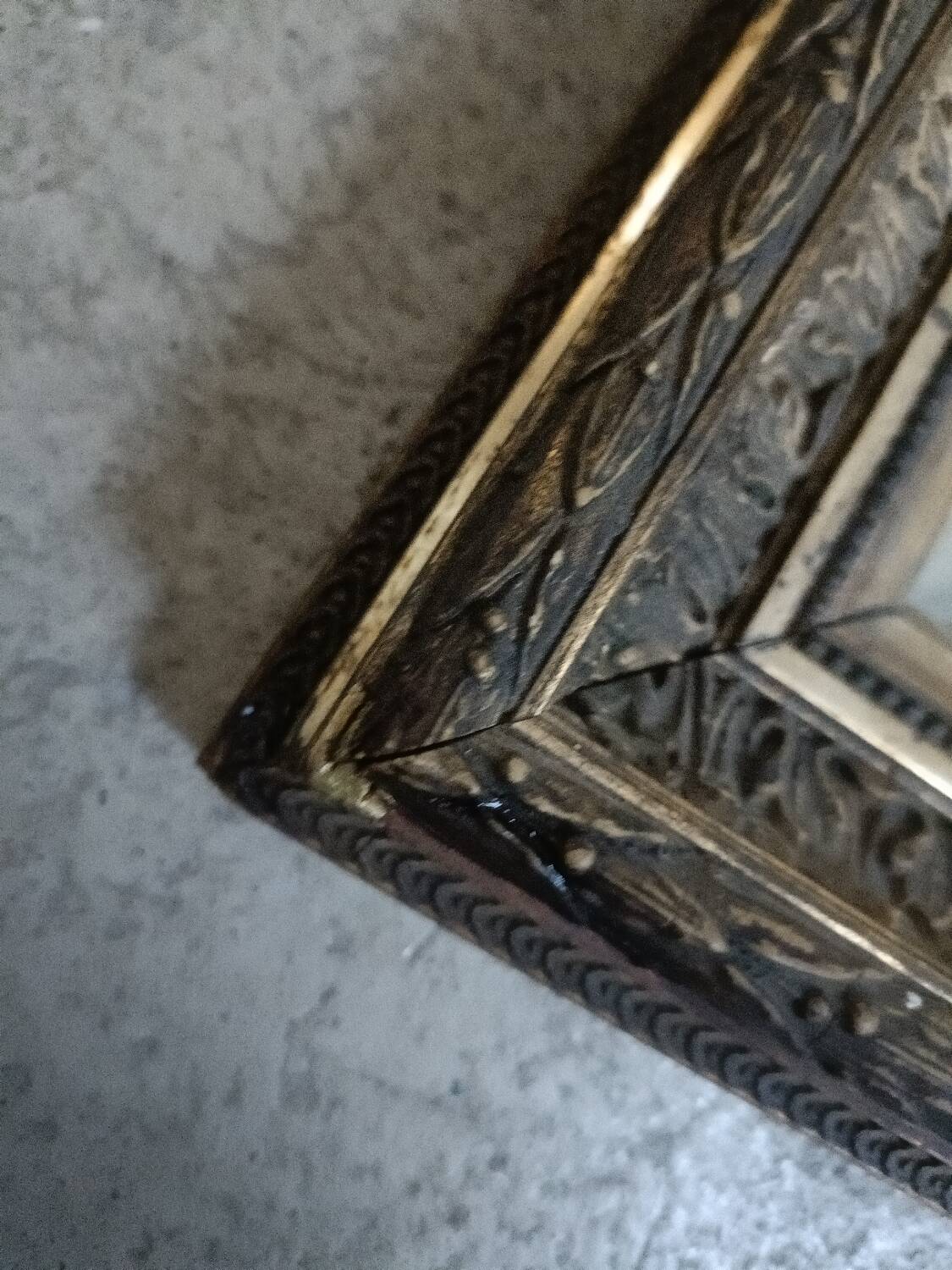 Antique mirror in wood and gilded stucco