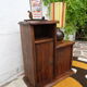 Asymmetrical brutalist furniture in solid elm