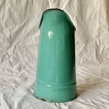Vintage pitcher in green enameled sheet metal