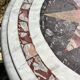 Round marble table with marble inlay