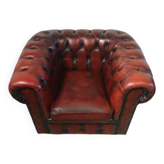 Fauteuil chesterfield cuir rouge antique