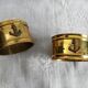Paire d'anciens ronds de serviette "ancre marine" laiton