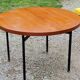 Vintage round table in blond mahogany by Gérard Guermonprez Editor Magnani, metal base