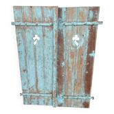 Pair of green wooden shutters