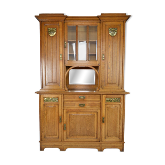 Art Nouveau oak buffet and dinanderie panels, circa 1910