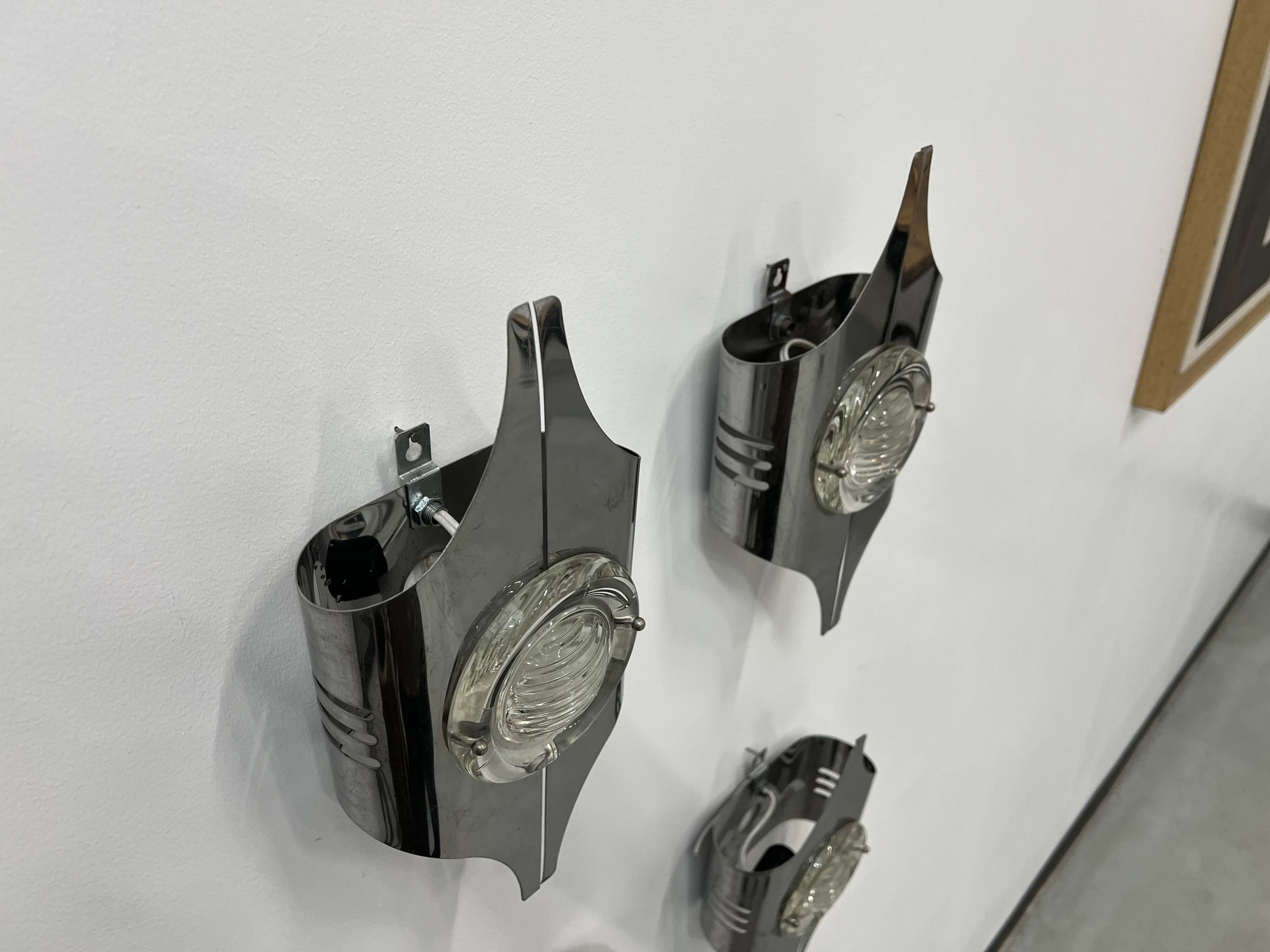 Wall lights by Oscar Torlasco