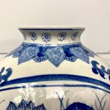Chinese vase in blue-white porcelain decorated with lotus flowers