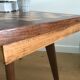 Side table with checkerboard pattern circa 1950