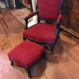 Old children's armchair with foot rests
