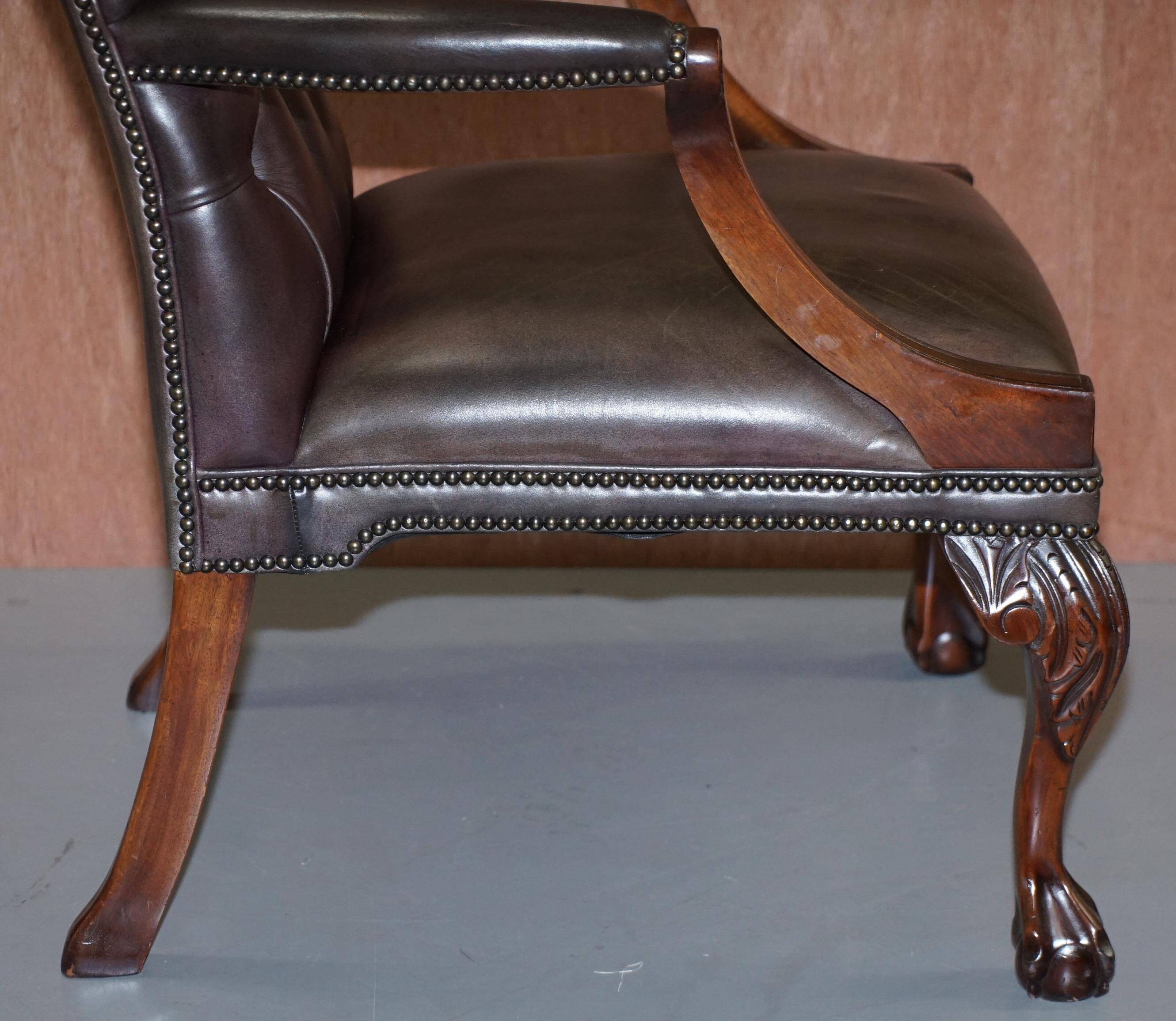 Gainsborough armchair George II leather Chesterfield hand-carved with claw and ball feet.
