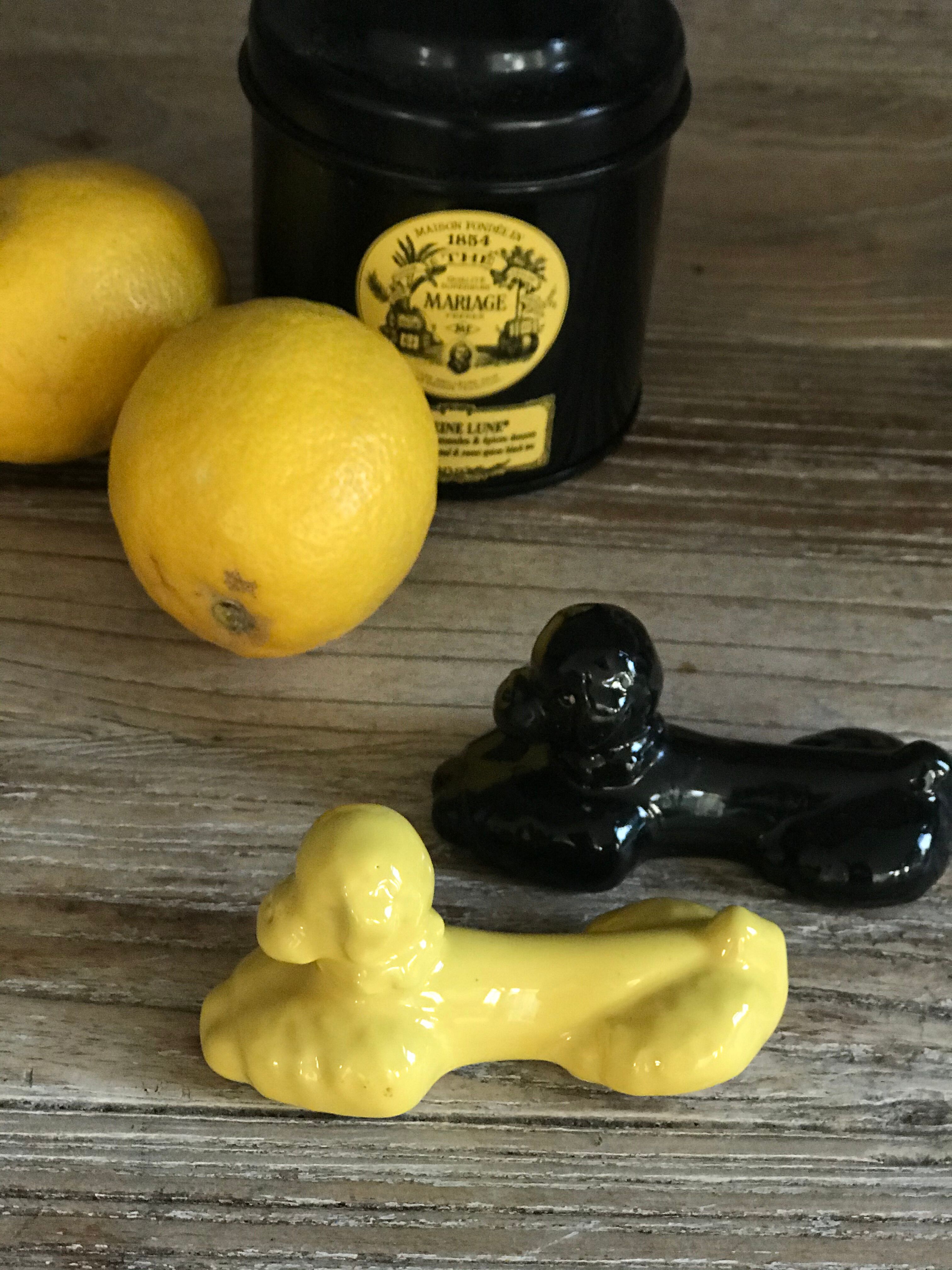 Lot of 12 vintage poodle-shaped knife holders