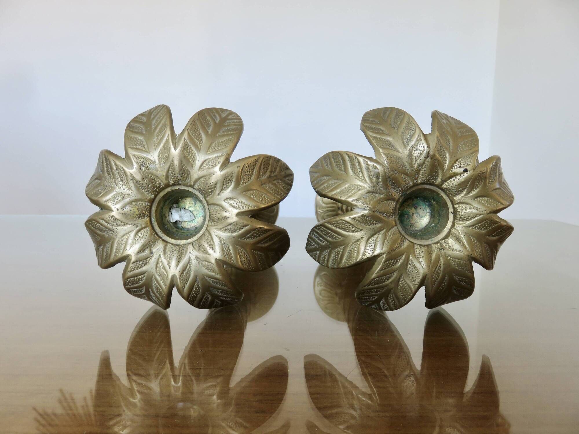 Pair of "palm tree" candlesticks in solid gilded brass, 1970
