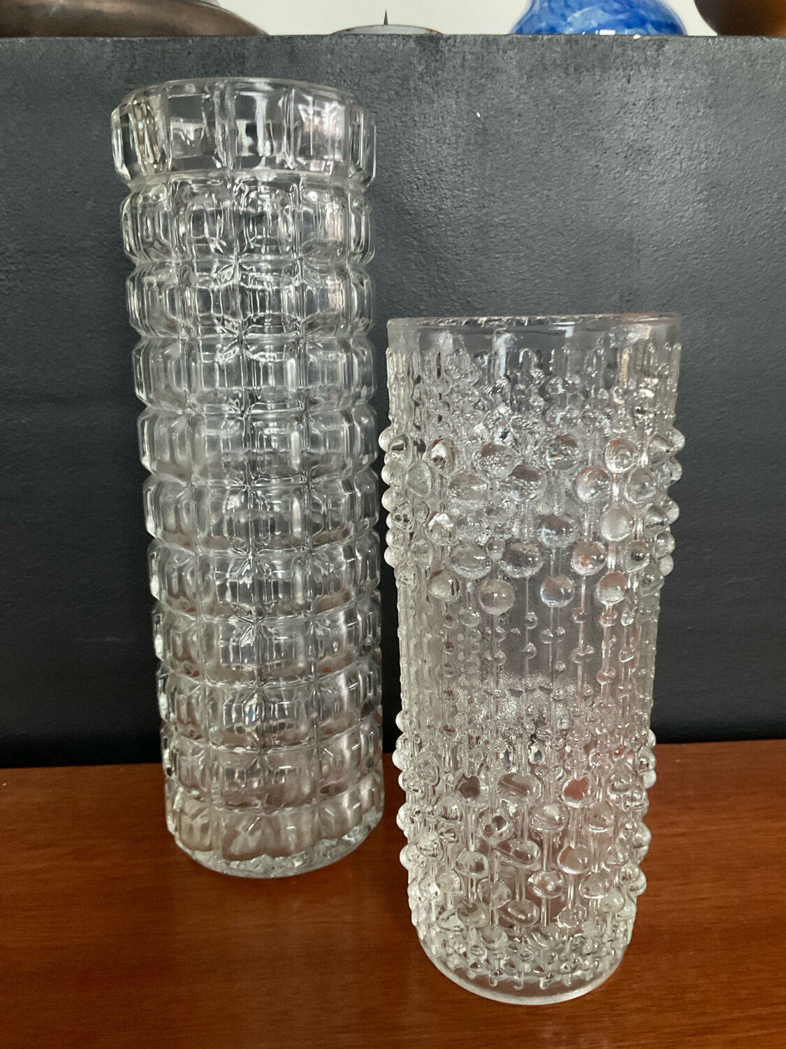 A pair of vintage rolled glass vases.
