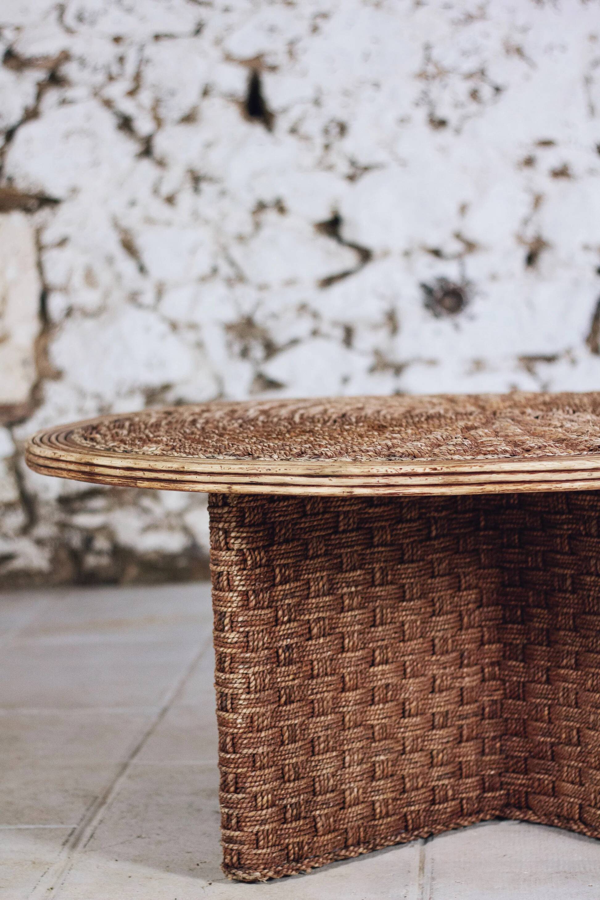 Round coffee table in braided cord and rattan, 1970.