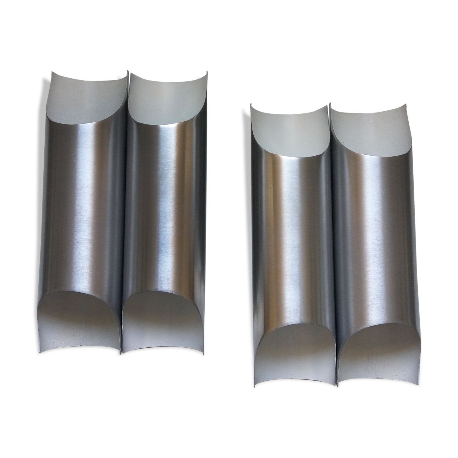 Pair of wall sconces by Fugue Raak